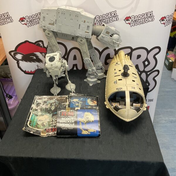 Front view of vintage Star Wars vehicle lot including AT-AT and Scout Walker.