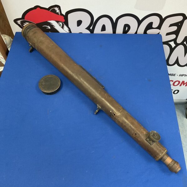 Side view of a vintage WWI artillery scope with brass construction.