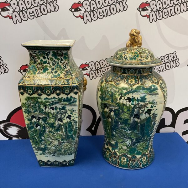 Intricate Chinese porcelain vase and lidded pot set with hand-painted scenes.