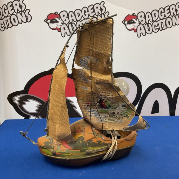 Vintage Dutch clog boat lamp with fabric sails.