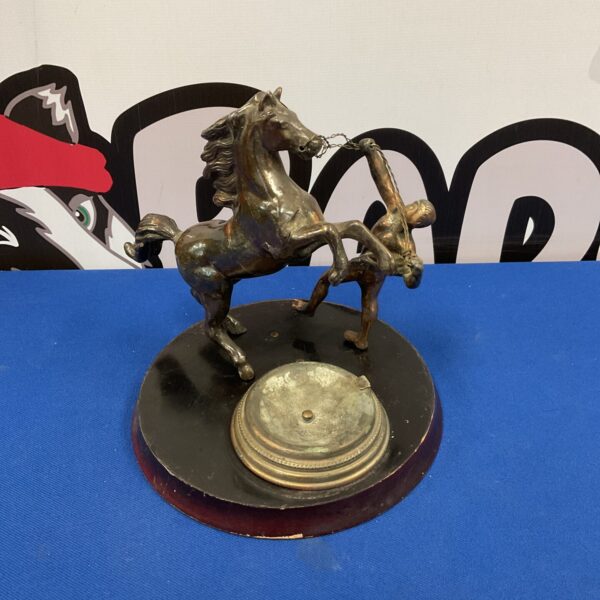 Vintage cast metal horse and farrier ashtray, detailed sculpture.