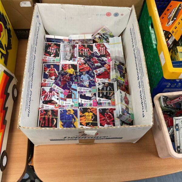 Large lot of Panini Adrenalyn XL Premier League trading cards in a box.
