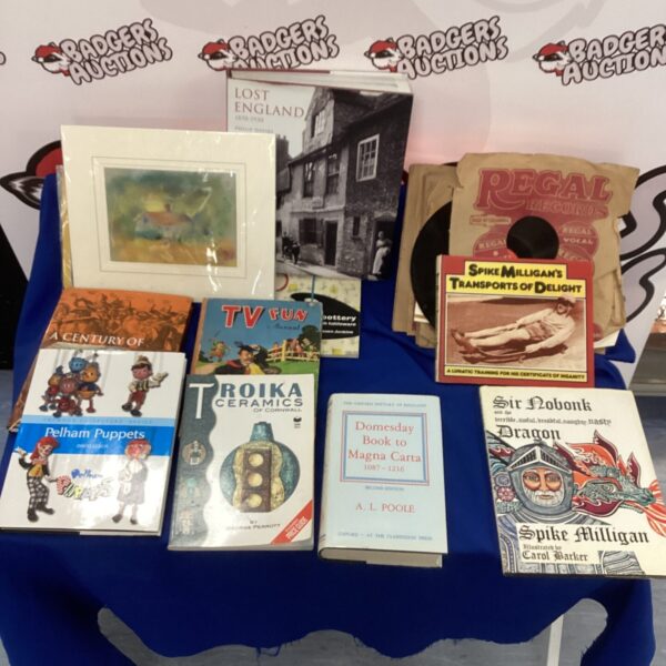 Mixed lot of vintage books and records, including Spike Milligan titles.