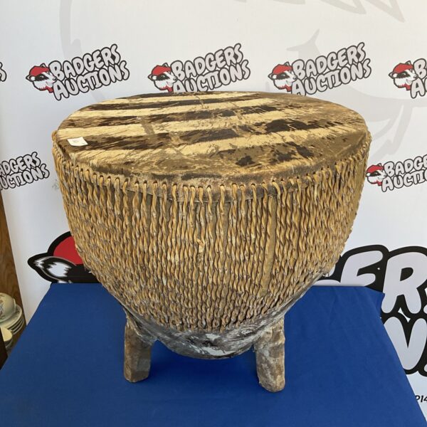 Large African floor drum with zebra skin hide.