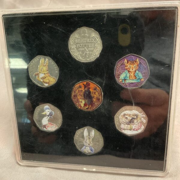 Complete set of 2016 Beatrix Potter 50p coins in protective case.
