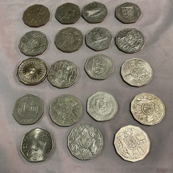 Overview of a lot of assorted 50p British and Commonwealth coins.
