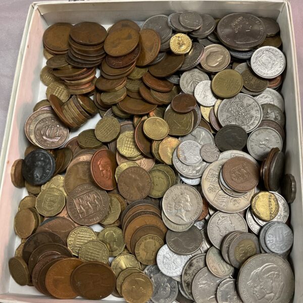 Assorted British coins in a tray, a collectible coin lot.