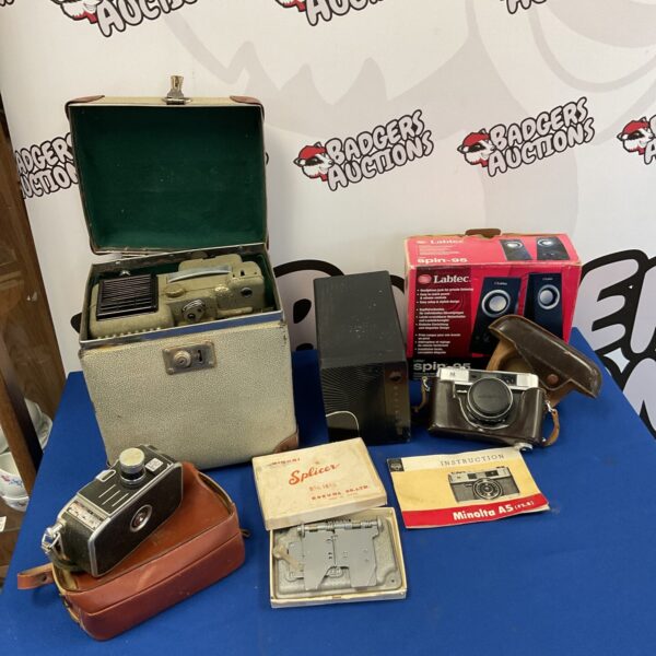 Vintage camera lot featuring a Minolta A5 and Paillard Bolex projector.