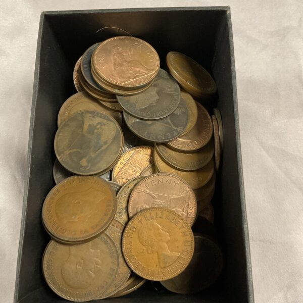 A box of vintage pre-decimal British pennies for collectors.