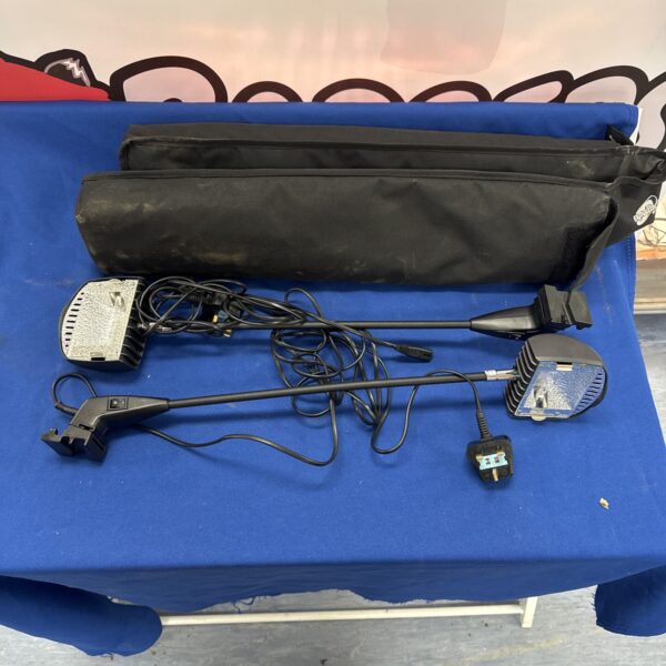 Pair of adjustable halogen spot lamps for task lighting.