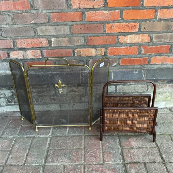 Vintage brass firescreen and bentwood magazine rack set for home decor.
