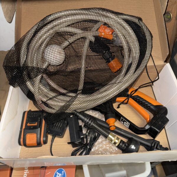 Worx Hydroshot cordless pressure washer with battery and charger.