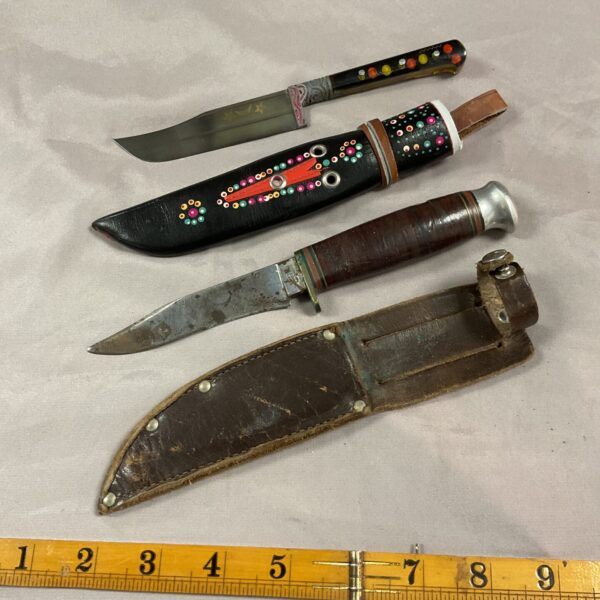 Vintage stack handle knife with leather sheath, Eastern decoration.