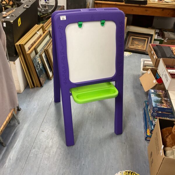 Bright purple Elc children’s easel with whiteboard and chalkboard.