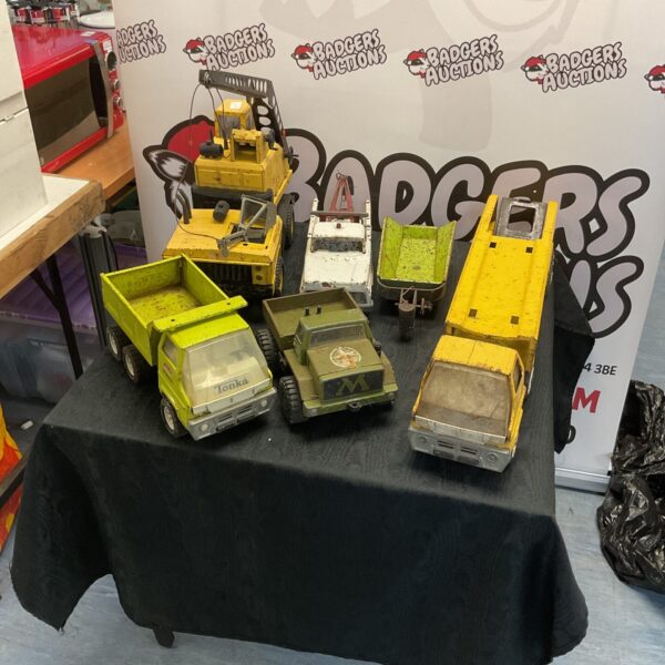 Vintage Tonka trucks lot including car transporter and Meccano jeep.