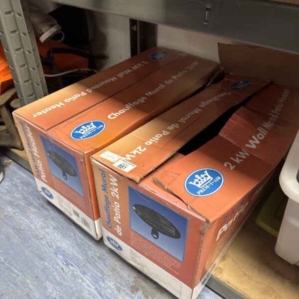 Two boxes of Prem-I-Air 2kw patio heaters for outdoor use.