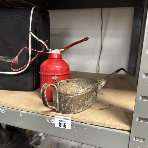 Vintage metal oil dripper can for workshop lubrication.
