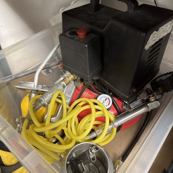 Amtech portable air compressor with spray gun attachments for restoration.