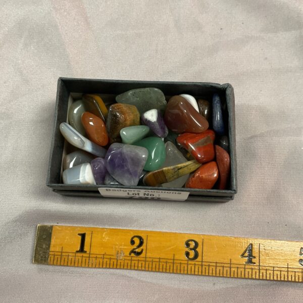 Polished semi-precious stones in a colourful lot for collectors.