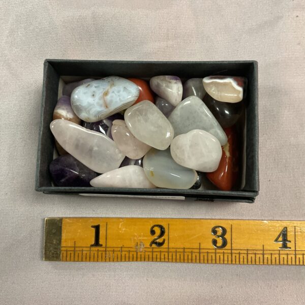 Polished semi-precious stones in a colourful collection.