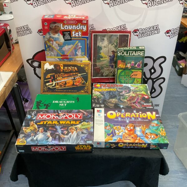 Mixed board games lot including Star Wars Monopoly and Operation.