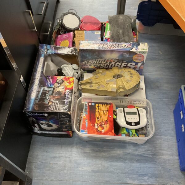Mixed toy lot featuring Roboni game and Micro Machines Millennium Falcon.