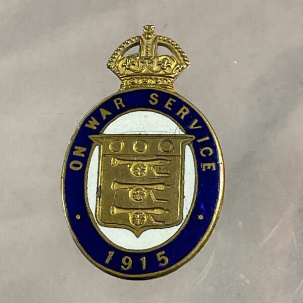 WW1 Munitions Workers badge 1915, enamel and gold design.