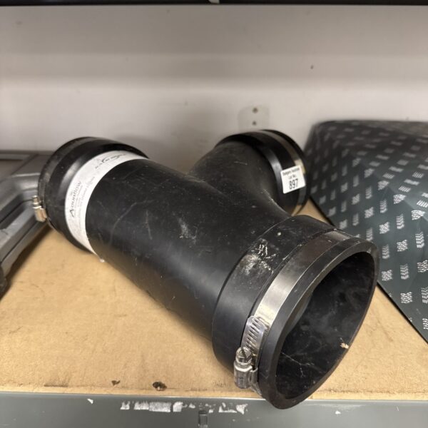 Used Aquaflow JCA09 flexible drainage pipe connector for plumbing.