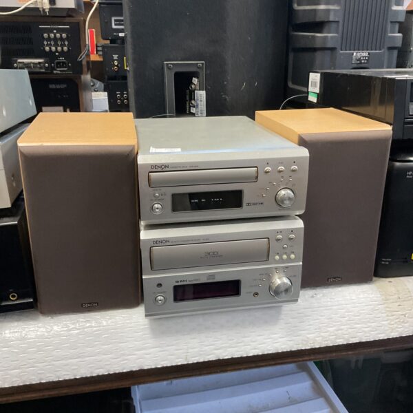 Silver Denon hifi system with cassette deck and CD player.