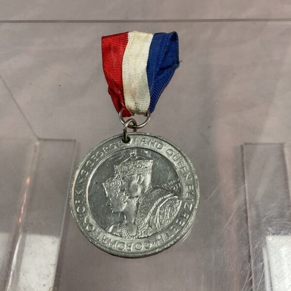 Front view of the King George VI coronation medal from 1937.