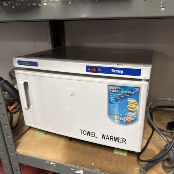 Vintage Kenley electric towel heater with on/off switch.