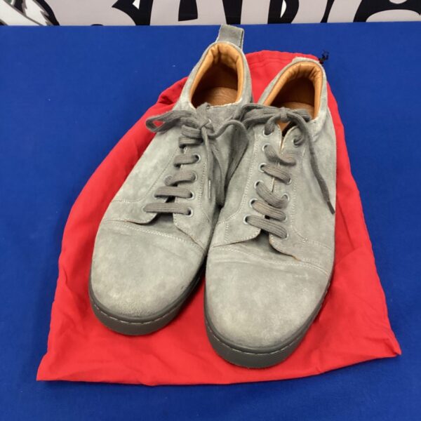 Grey Christian Louboutin trainers size 42, stylish designer footwear.