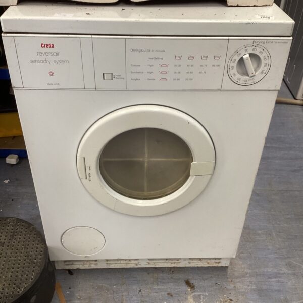 Vintage Creda tumble dryer, a retro laundry appliance in used condition.