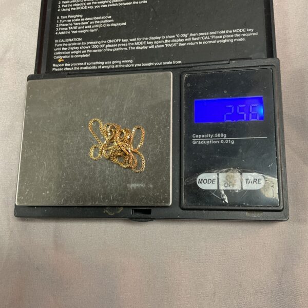 Digital precision scale displaying 2.56g, ideal for weighing jewellery.