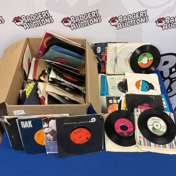 Vintage lot of 7 inch vinyl records for collectors.