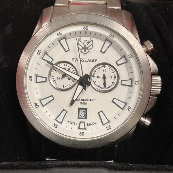 Silver Swiss Eagle wristwatch with white dial and chronograph features.