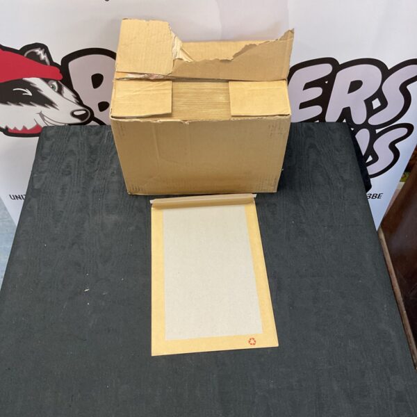 Stack of unused white envelopes, ideal for mailing and stationery.