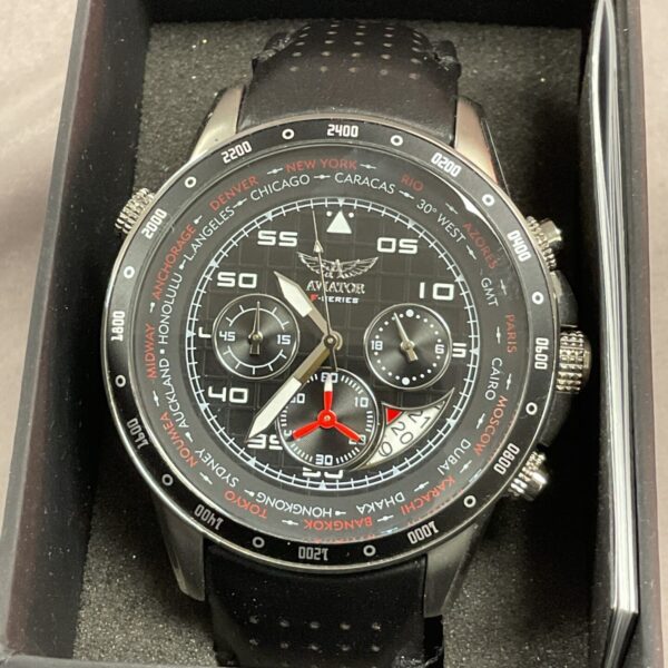 Black dial Aviator wristwatch with world time bezel.