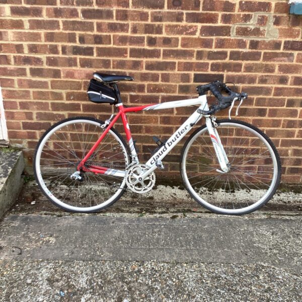 Red and white Claud Butler Roubaix racing bike for sale.