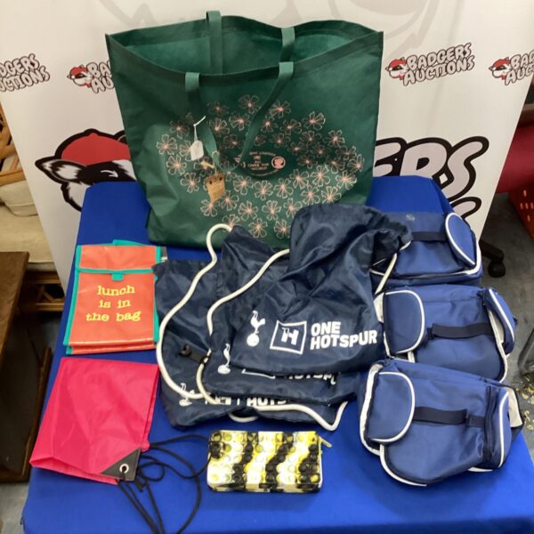 Selection of Tottenham Hotspur Spurs bags and lunch bags on display.