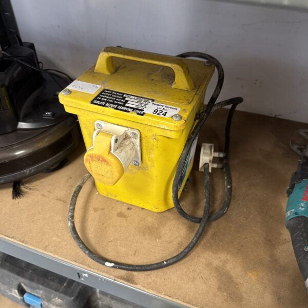 Vintage 110v transformer block for electrical conversion.