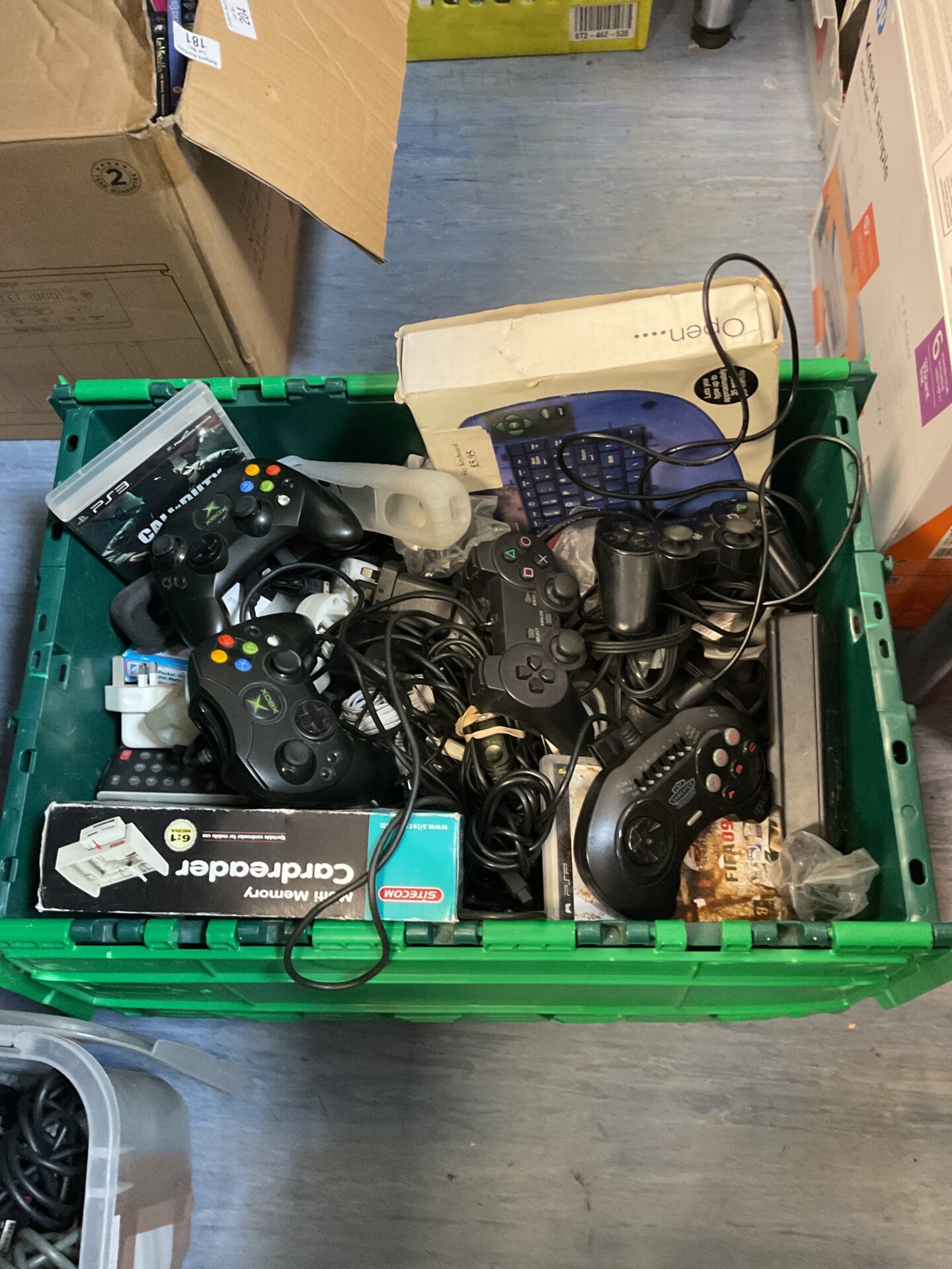 180 Large crate of mixed electricals inc gaming controllers & remotes