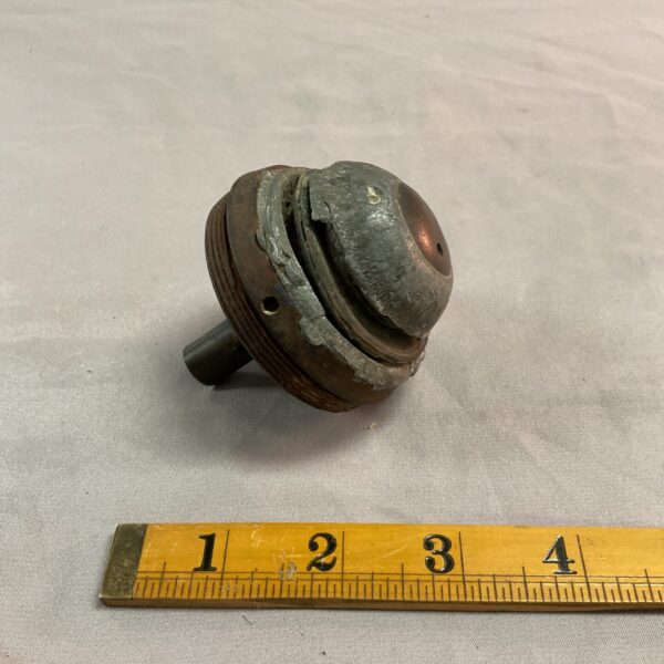 Weathered German Z96 fuse, side view, WWI relic.