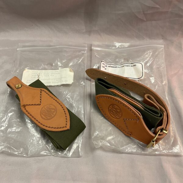 Vintage Delux webbing gun sling with leather detailing.