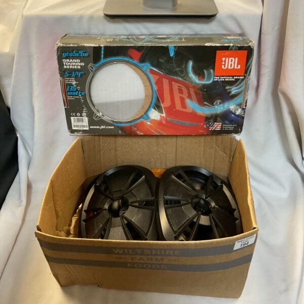 Vintage JBL and Boss car speaker pair in original packaging.