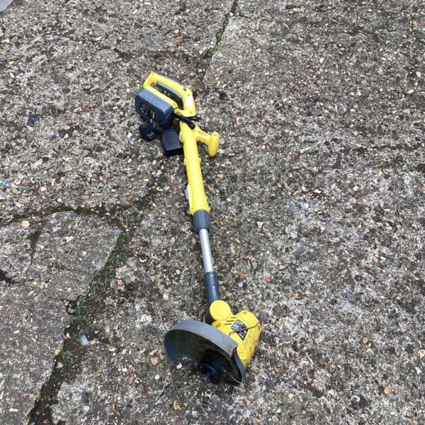 Used Challenge cordless strimmer for garden maintenance.