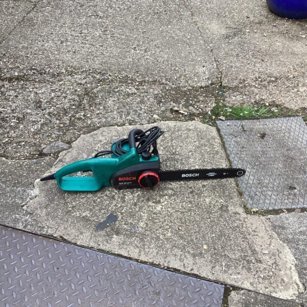 Used Bosch electric chainsaw for garden and DIY projects.