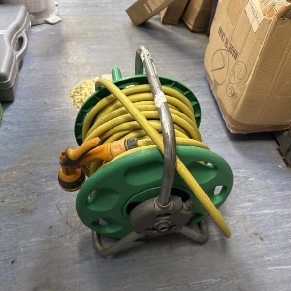 Used Hozelock hose reel for garden hose storage.