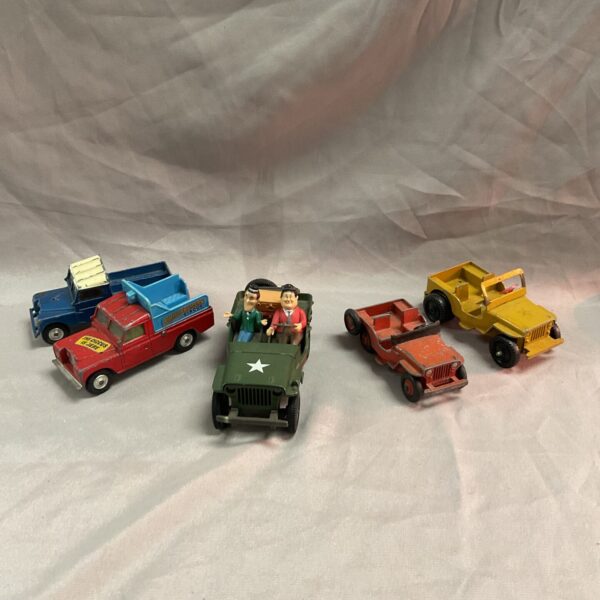 Vintage diecast Jeep and Landrover lot with Laurel and Hardy figure.
