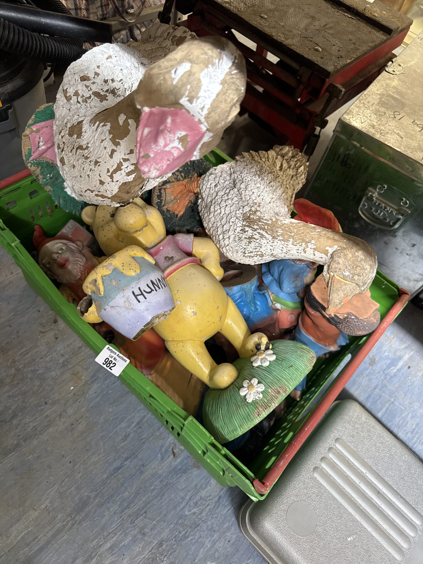 982 Box of garden ornaments inc Winnie the Pooh (has damaged hand)